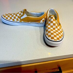 Classic Vans checkered slip ons golden yellow.
